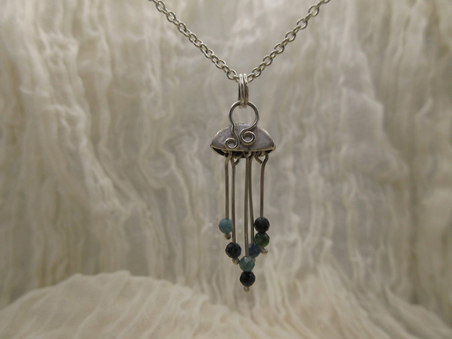 Indicolite blue tourmaline jellyfish pendant in argentium sterling silver