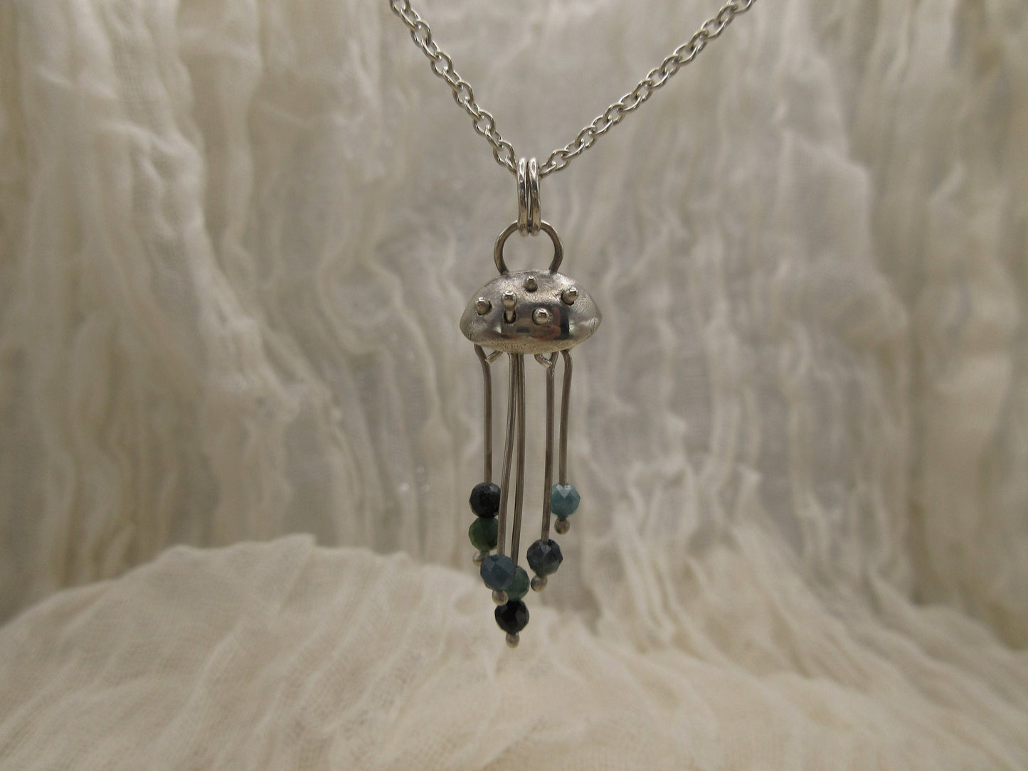 Indicolite blue tourmaline jellyfish pendant in argentium sterling silver