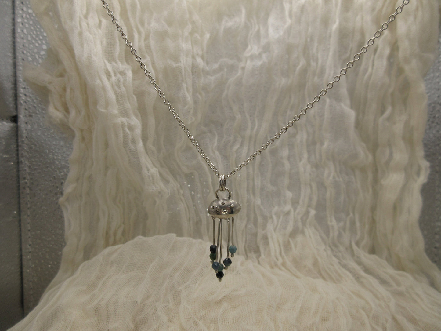 Indicolite blue tourmaline jellyfish pendant in argentium sterling silver