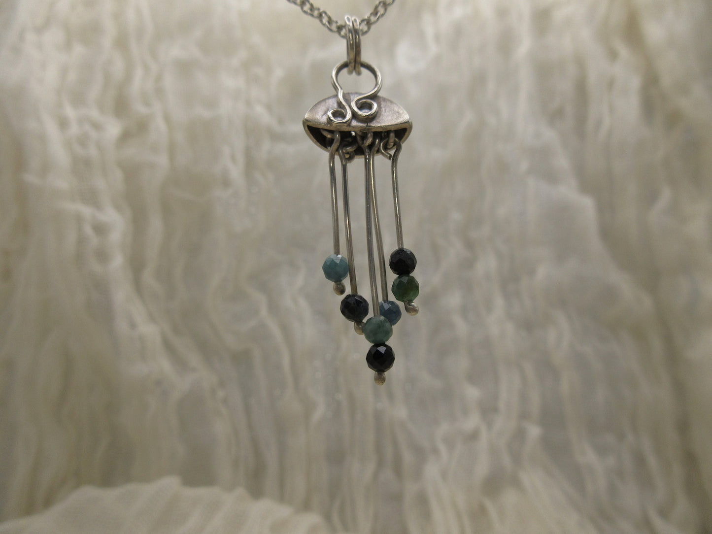 Indicolite blue tourmaline jellyfish pendant in argentium sterling silver