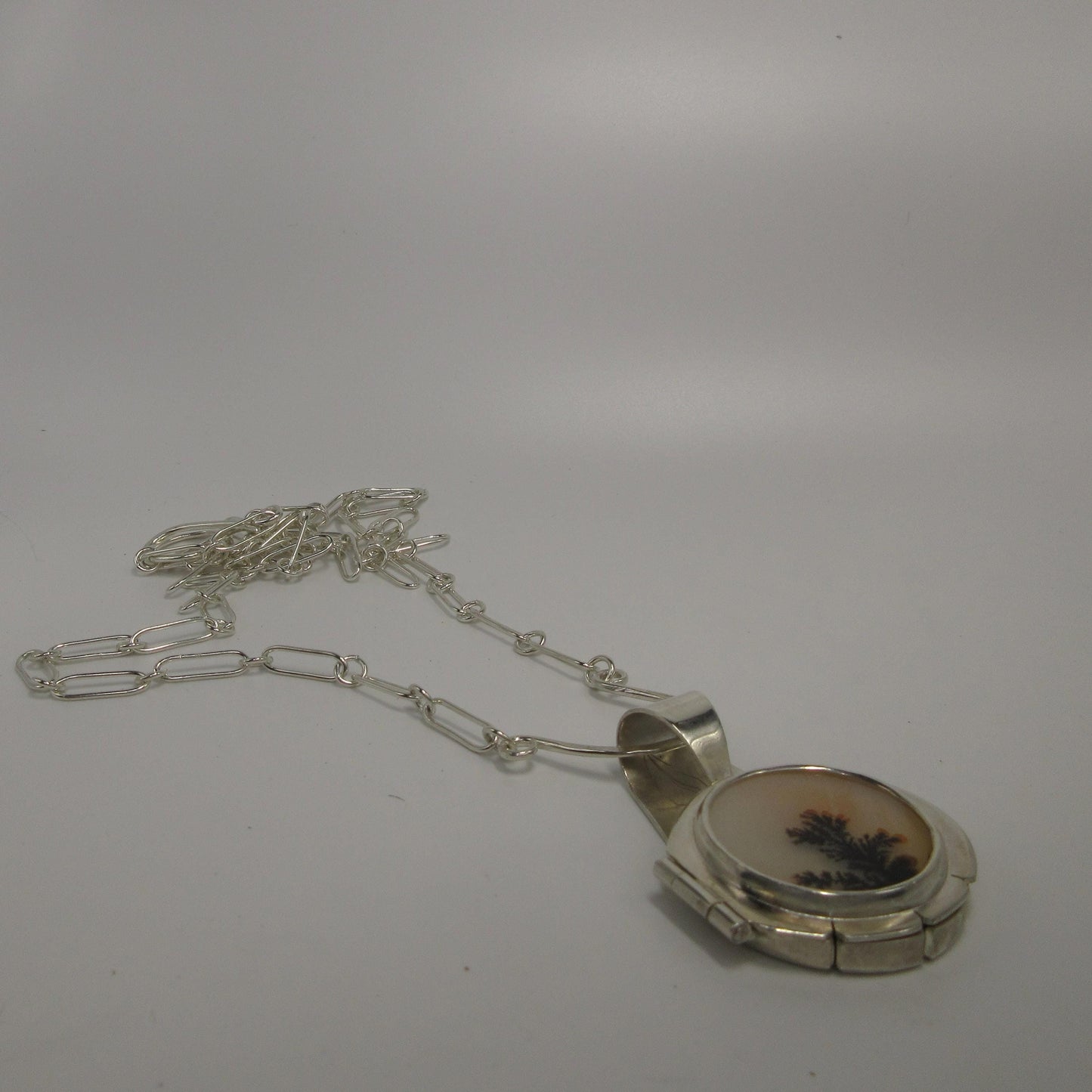 Fiber Artist Locket in argentium sterling silver with dendritic agate