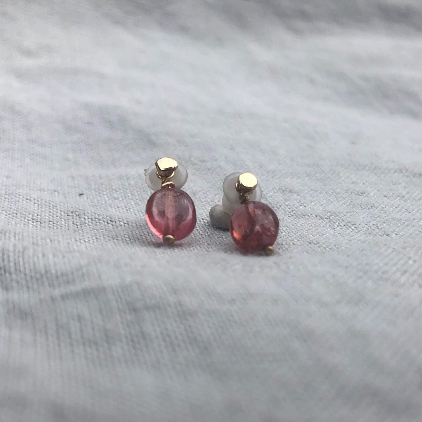 Solid gold stud earrings with removable pink tourmaline gemstones