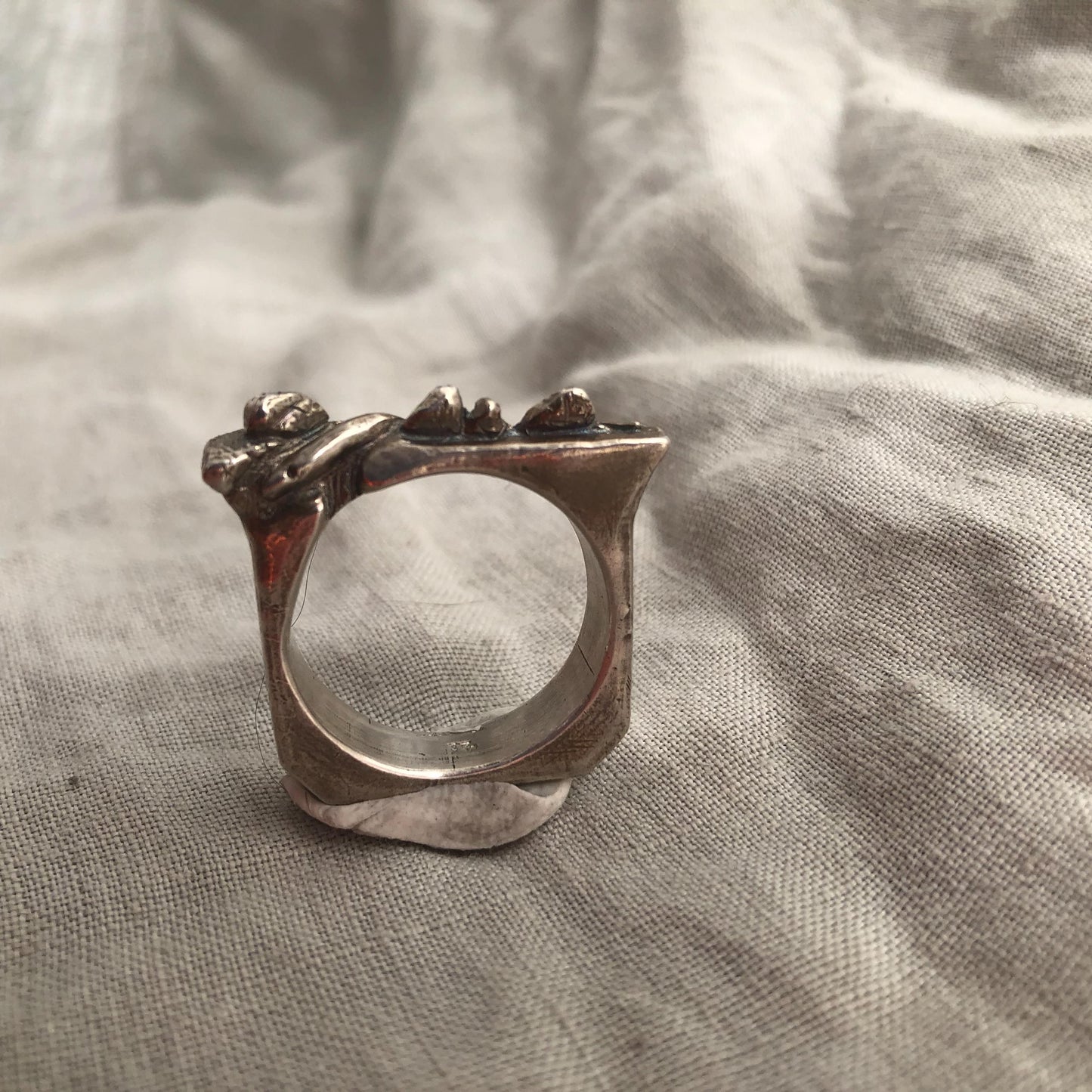 Snake on a rock wall ring in argentium sterling silver // U.S. size 11