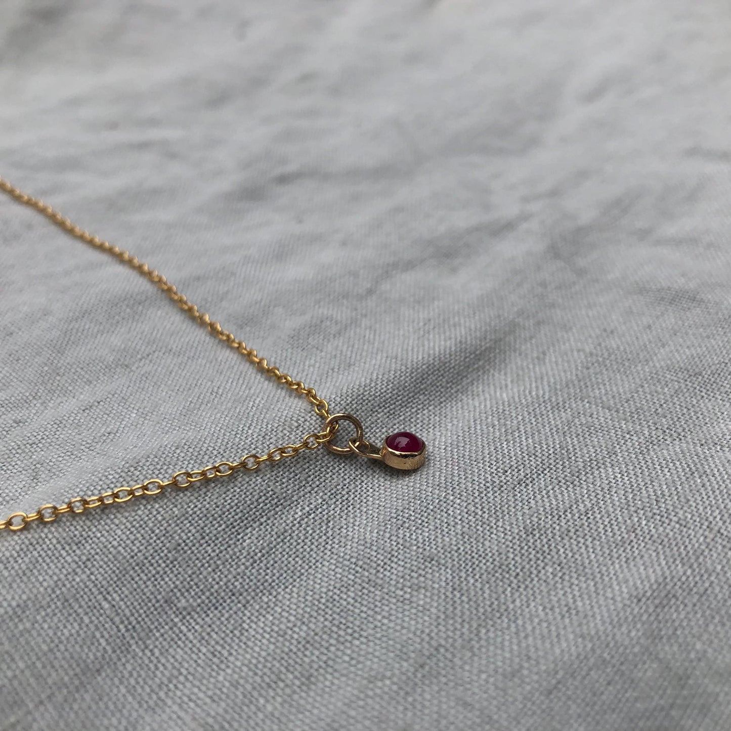 Solid gold ruby cabochon pendant // 14 karat gold ruby pendant // Tiny ruby pendant
