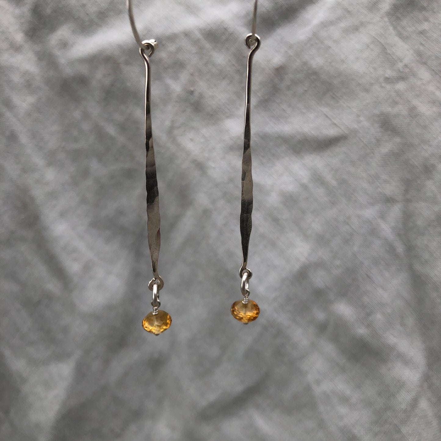 Hammered drop earrings in argentium sterling silver with microfaceted citrine // Kinetic sculptural earrings // November birthstone earrings