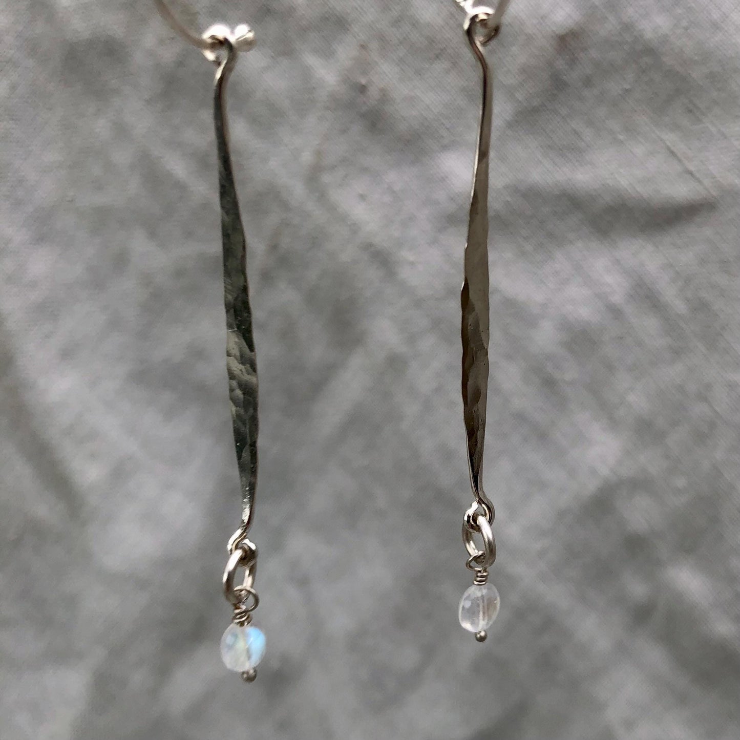 Hammered drop earrings in argentium sterling silver with moonstone // Kinetic sculptural earrings // June birthstone earrings
