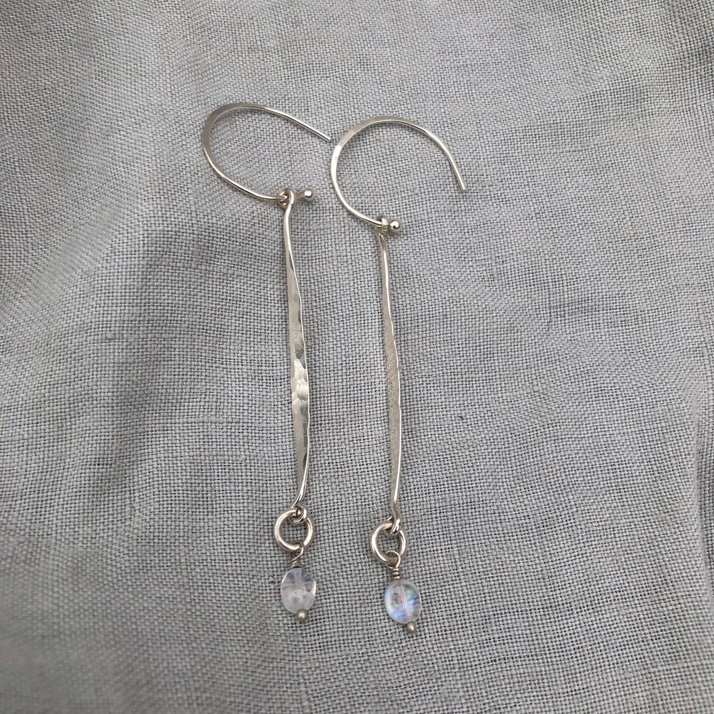 Hammered drop earrings in argentium sterling silver with moonstone // Kinetic sculptural earrings // June birthstone earrings