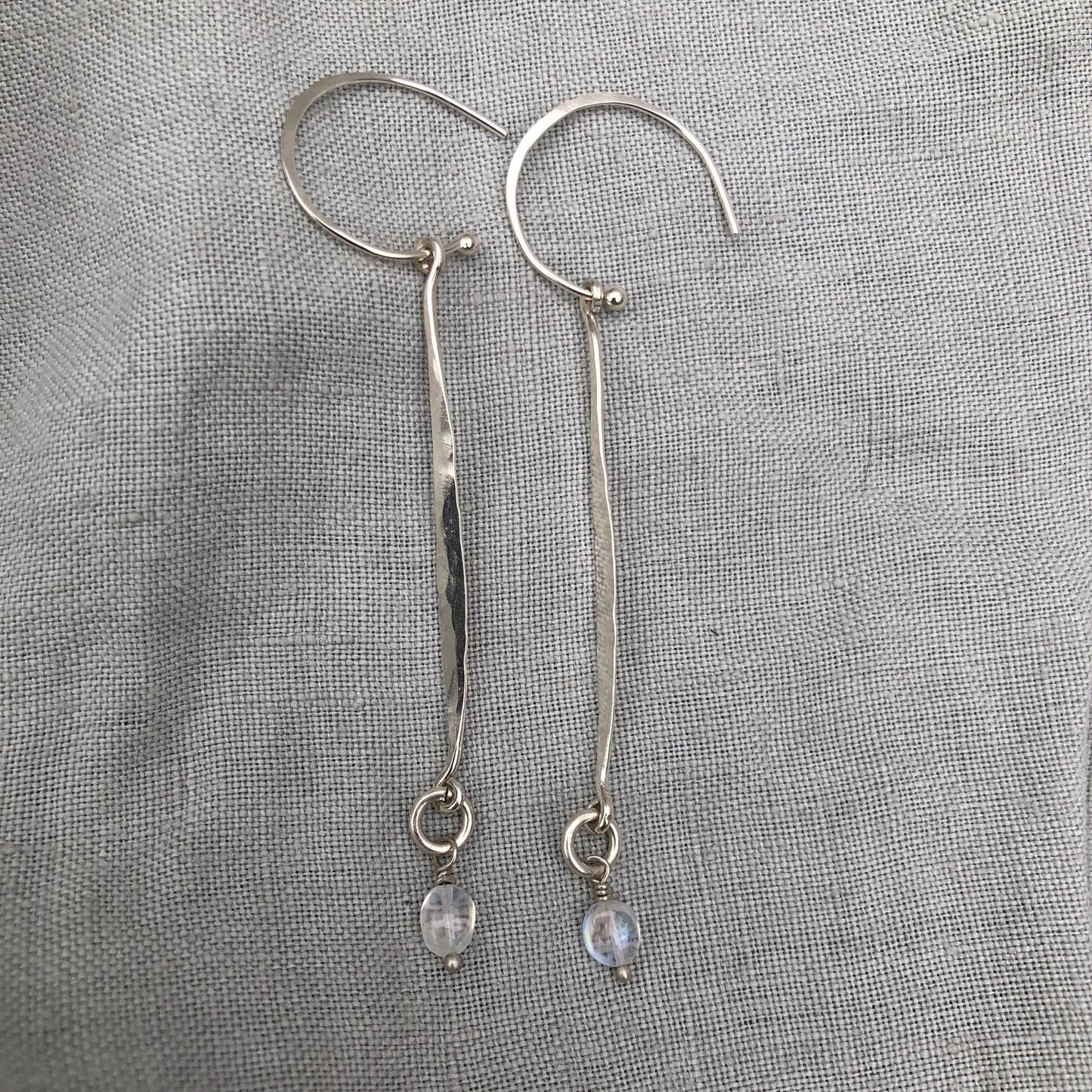 Hammered drop earrings in argentium sterling silver with moonstone // Kinetic sculptural earrings // June birthstone earrings