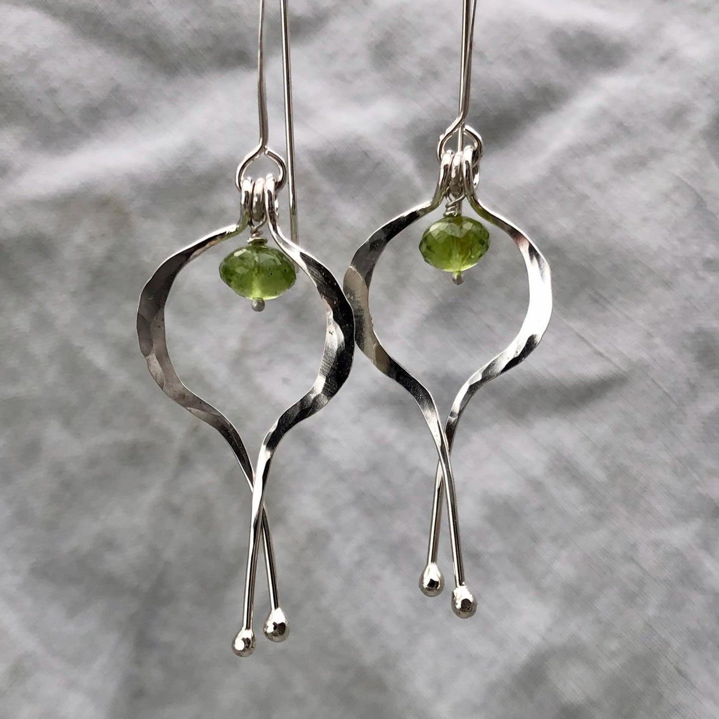 Double scoop earrings in argentium sterling silver with microfaceted peridot // Kinetic sculptural earrings // August birthstone earrings