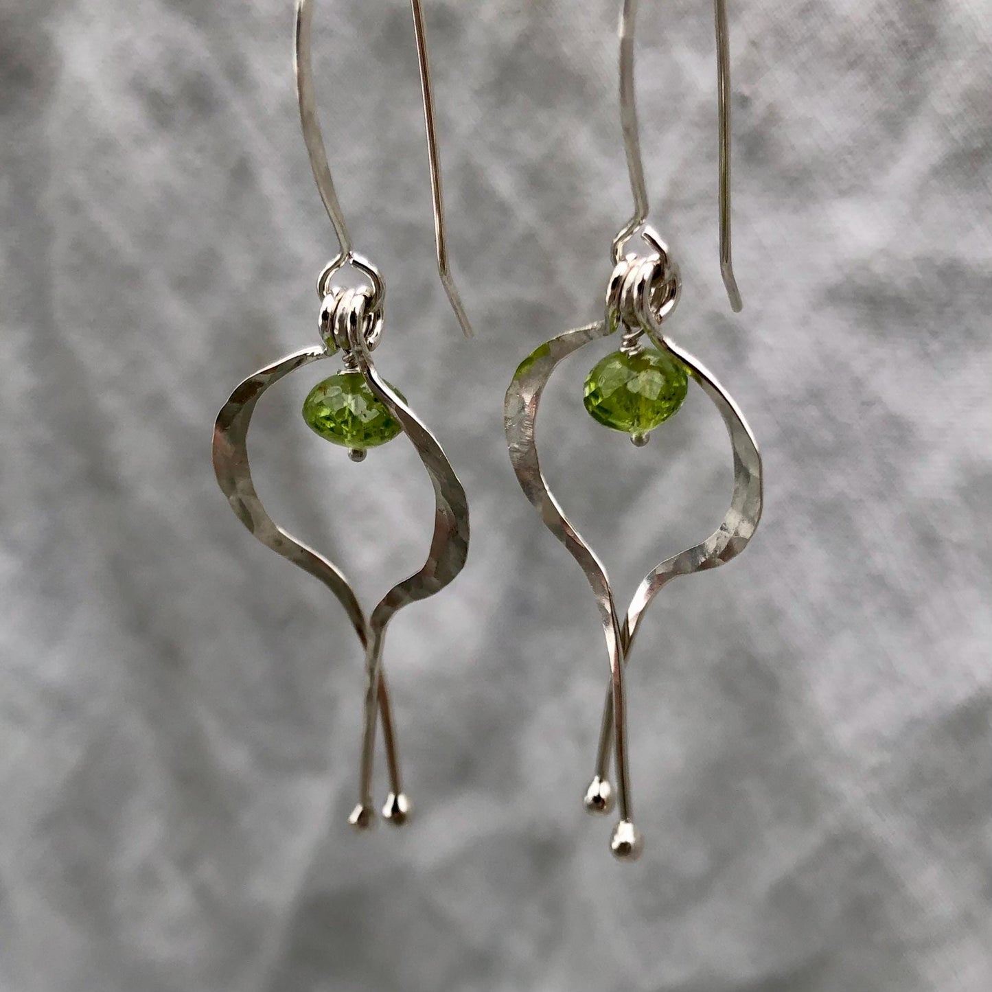 Double scoop earrings in argentium sterling silver with microfaceted peridot // Kinetic sculptural earrings // August birthstone earrings