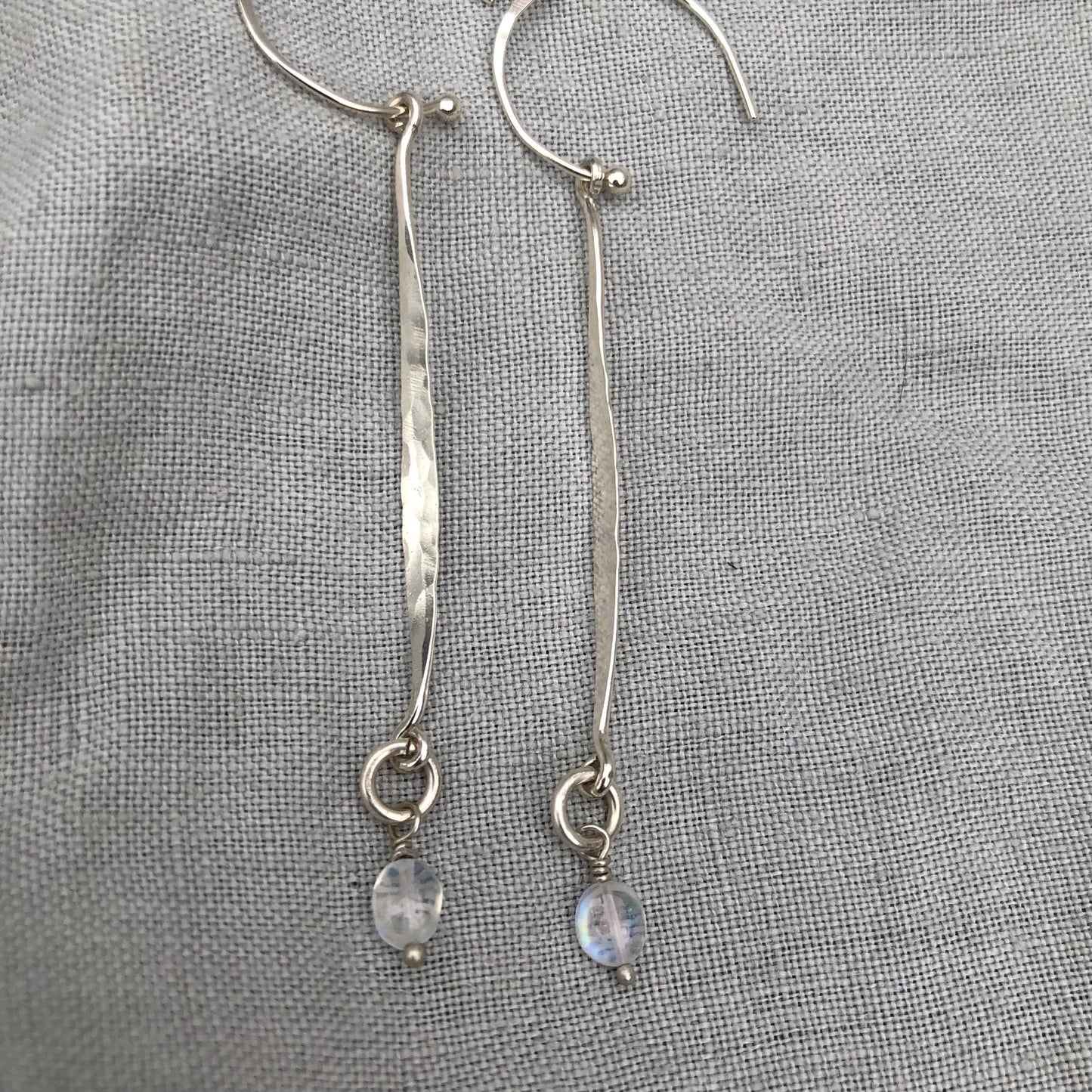 Hammered drop earrings in argentium sterling silver with moonstone // Kinetic sculptural earrings // June birthstone earrings