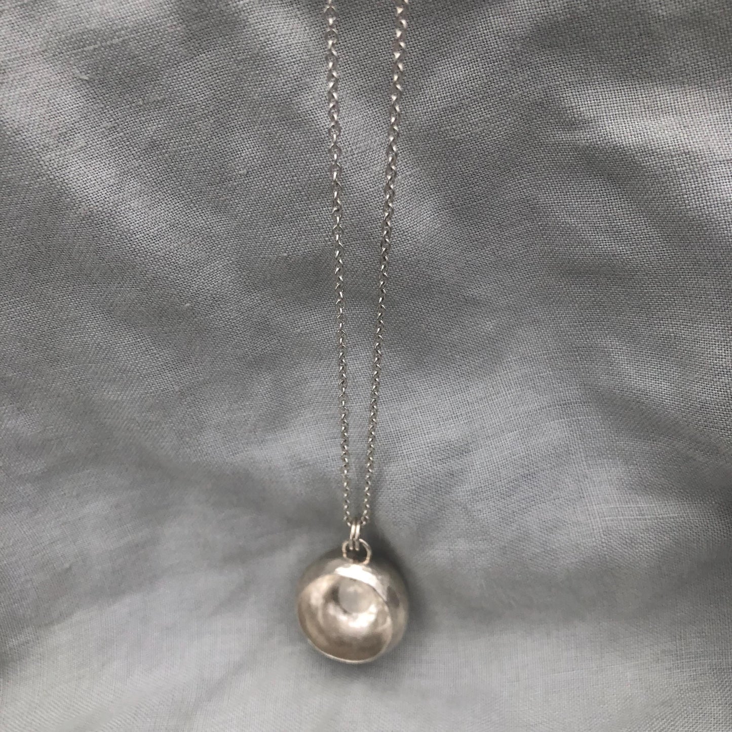 Moonstone hollow vessel pendant in argentium sterling silver