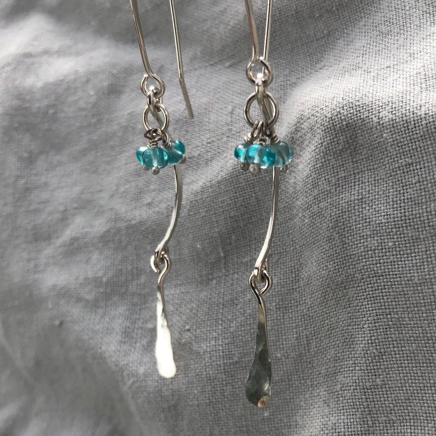 C-curve earrings in argentium sterling silver with bright blue apatite