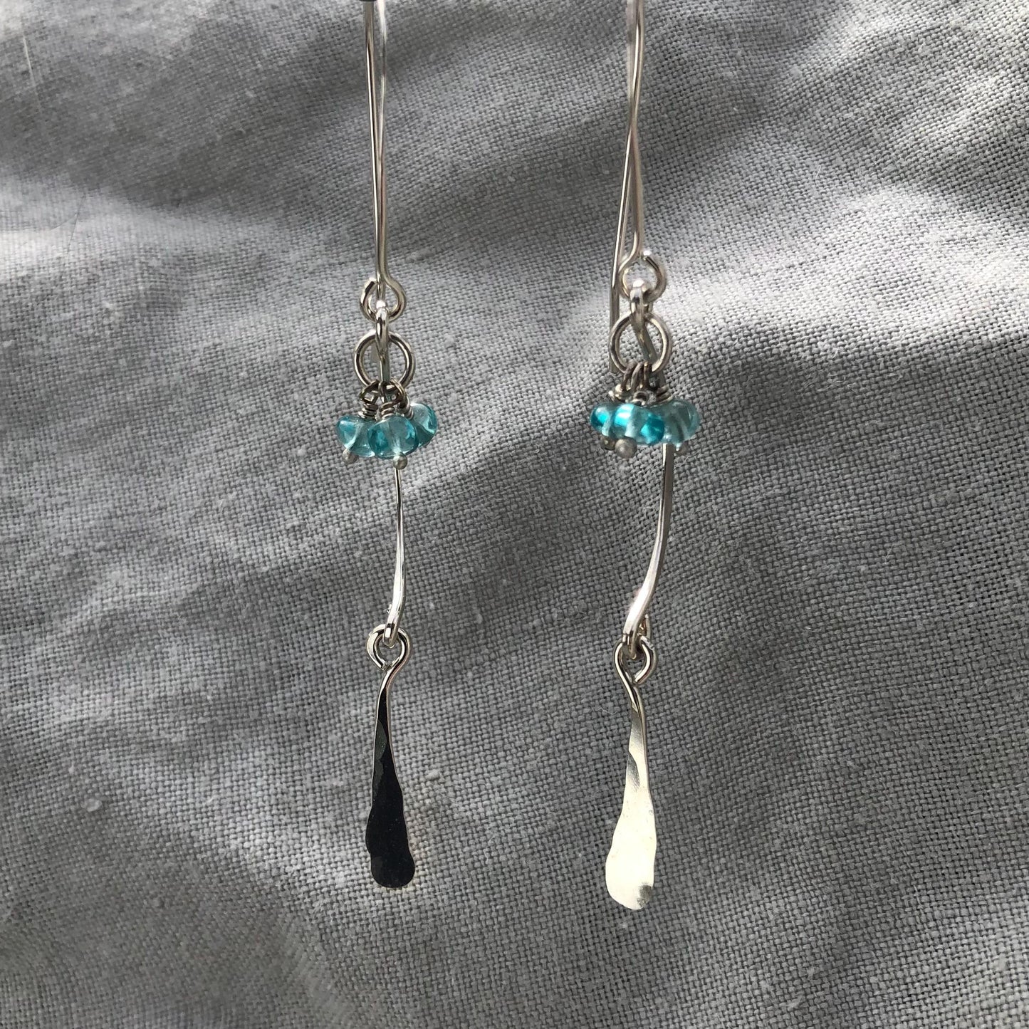 C-curve earrings in argentium sterling silver with bright blue apatite