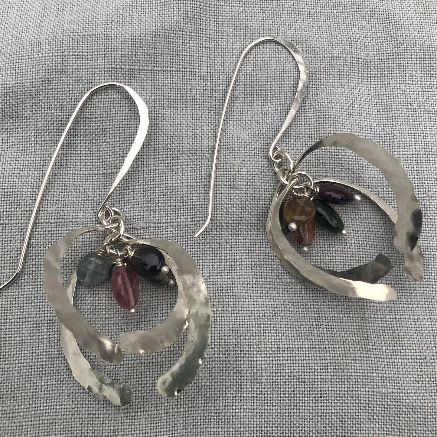 Open globe statement earrings in argentium sterling silver with multicolored tourmaline