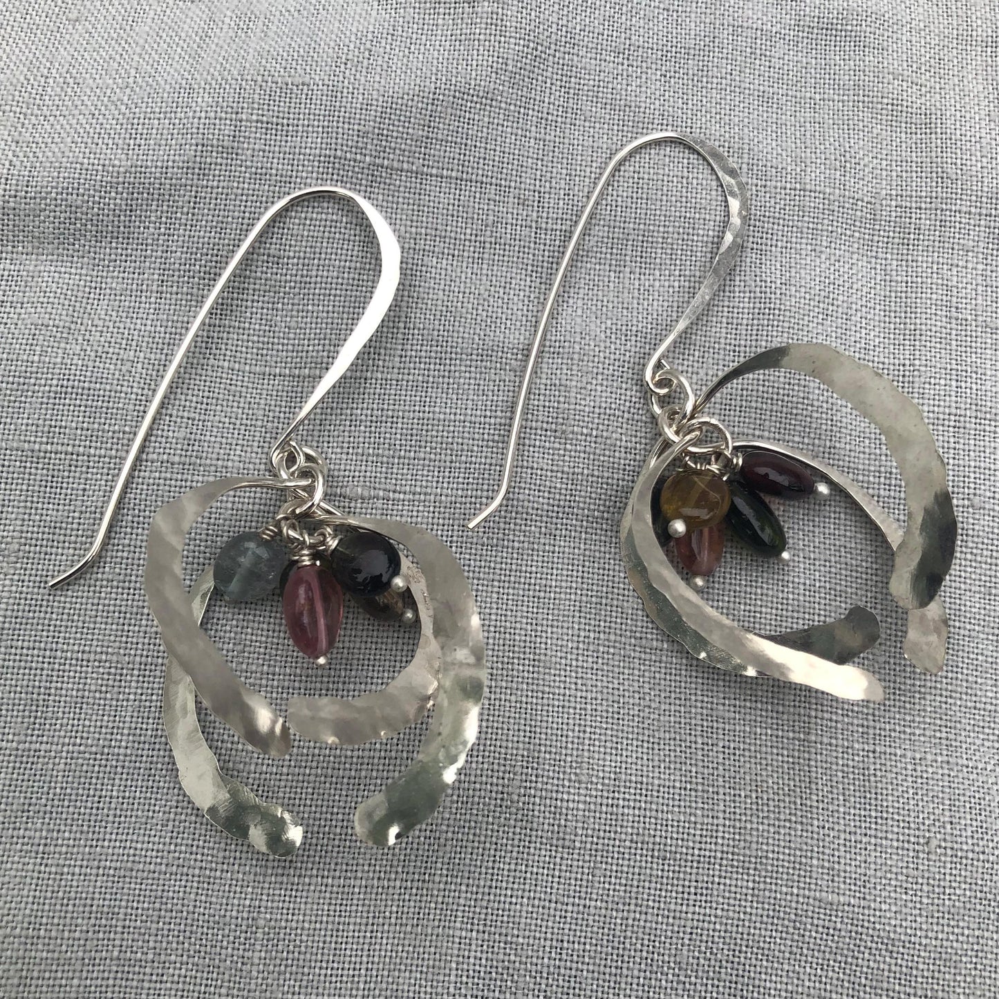 Open globe statement earrings in argentium sterling silver with multicolored tourmaline