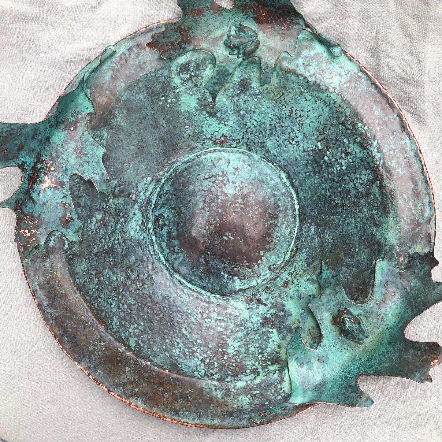 Vernal pool bowl with spring peeper frogs and oak leaves in copper and bronze with verdigris patina