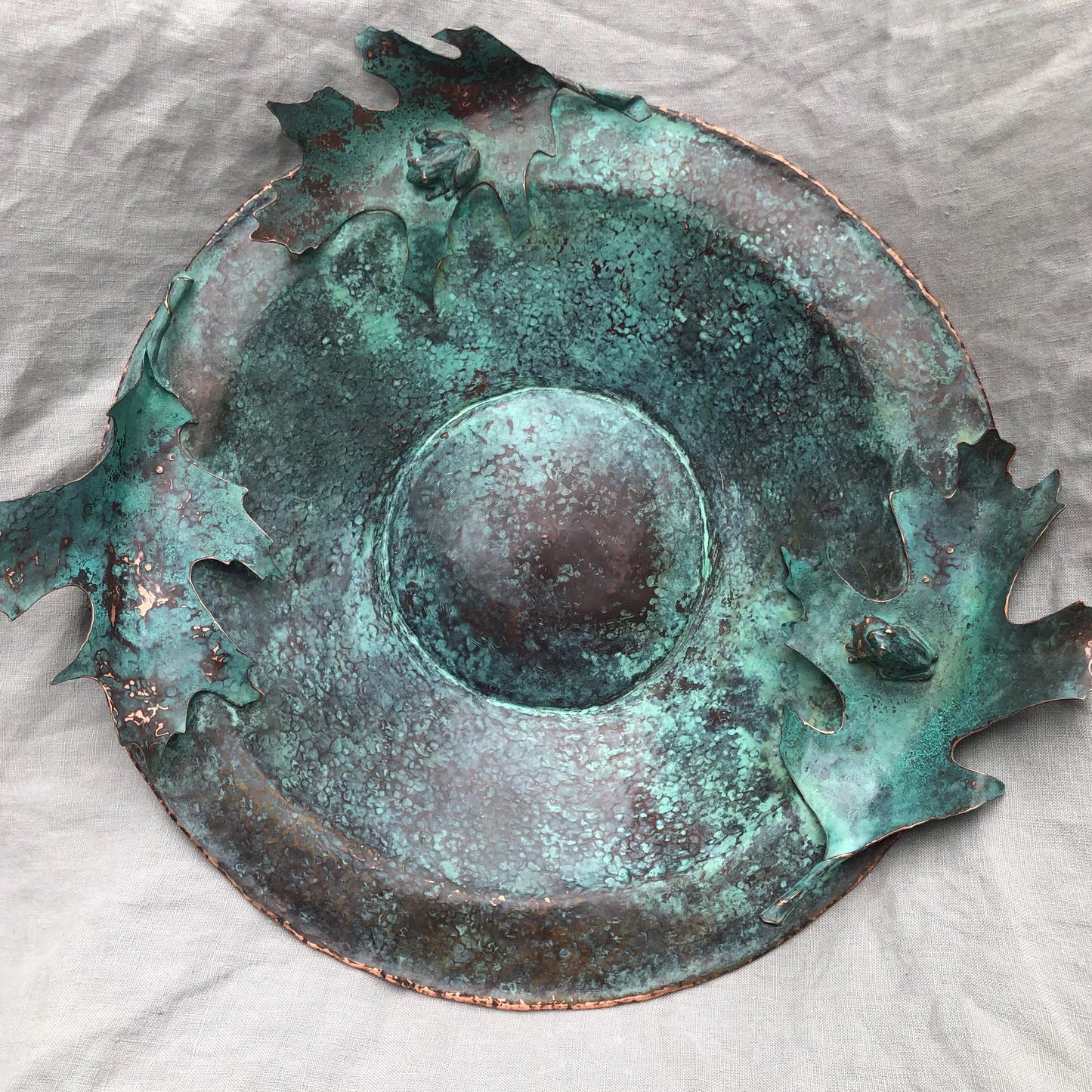 Vernal pool bowl with spring peeper frogs and oak leaves in copper and bronze with verdigris patina