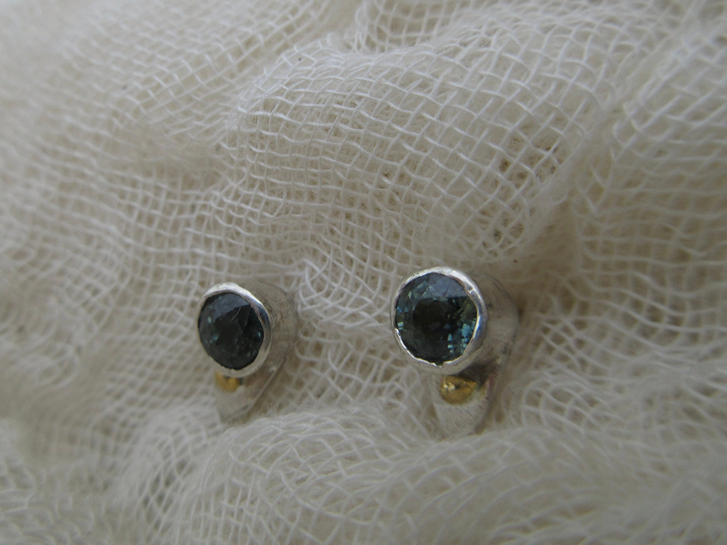 Sapphire stud earrings in argentium sterling silver and 24 karat gold