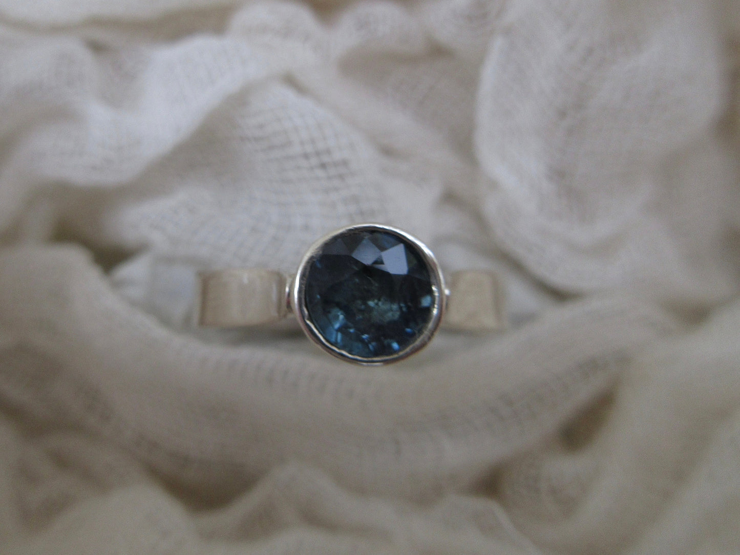 Starlight ring in argentium sterling silver with a natural light blue sapphire