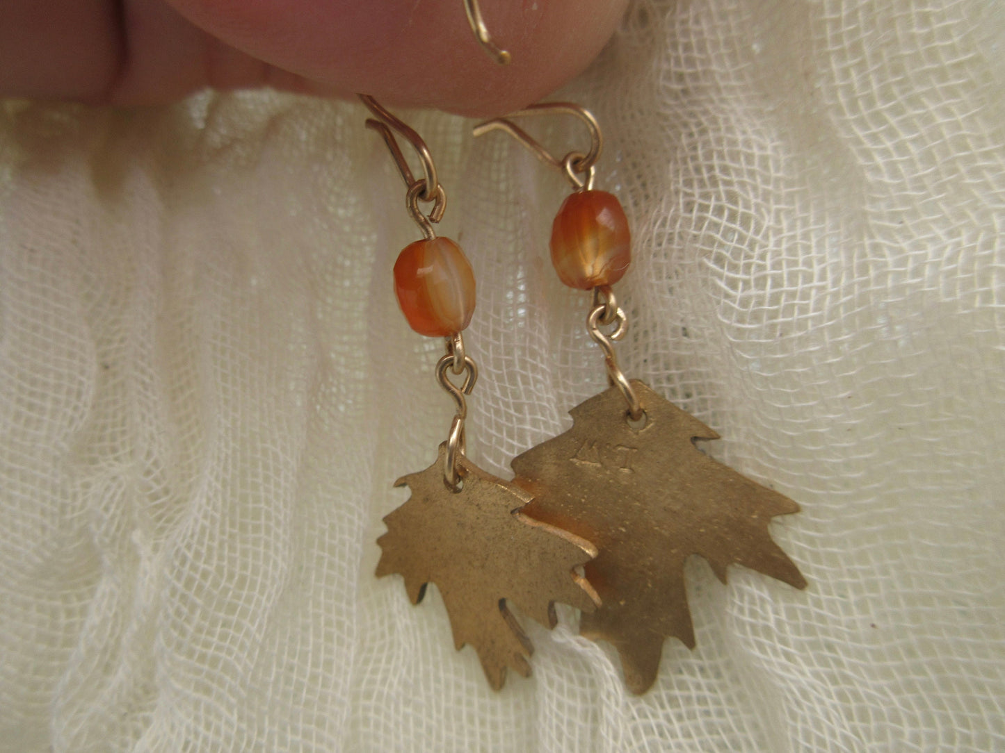 Brass maple leaf earrings with carnelian and gold-filled ear wires