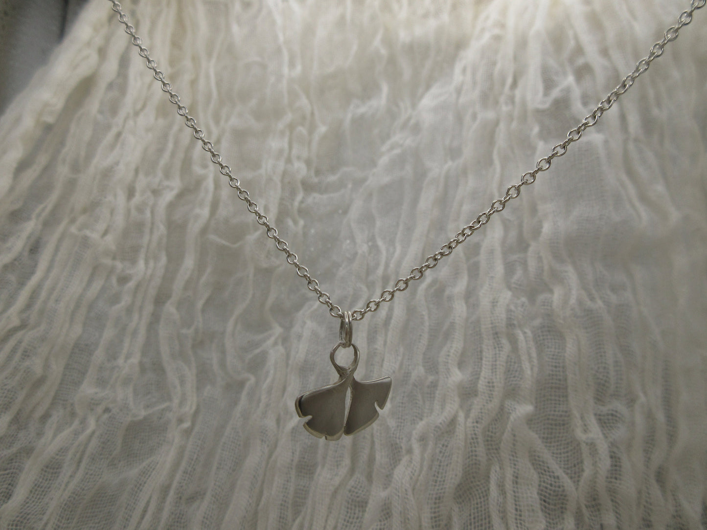 Double ginkgo leaf pendant in argentium sterling silver